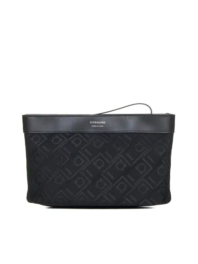 Ferragamo Salvatore  Monogrammed Zipped Clutch Bag In Black