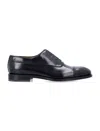 Ferragamo Fermin Leather Oxford Shoes In Black