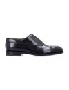Ferragamo Fermin Leather Oxford Shoes In Black