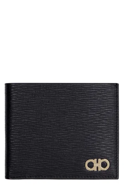 Ferragamo Gancini Leather Flap-over Wallet In Nero/nero