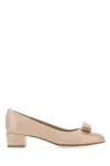 Ferragamo Round Toe Low Block Heel Patent Pumps In Petalo