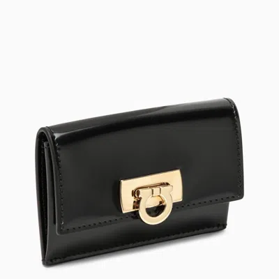 Ferragamo Sleek Black Leather Card Case With Gancini Hook Detail In Burgundy