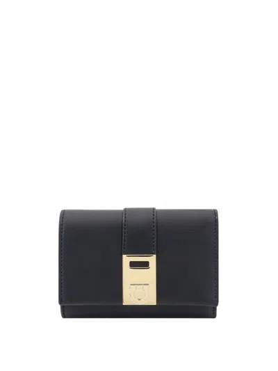 Ferragamo Sleek Calfskin Wallet With Gold-tone Clasp In Black
