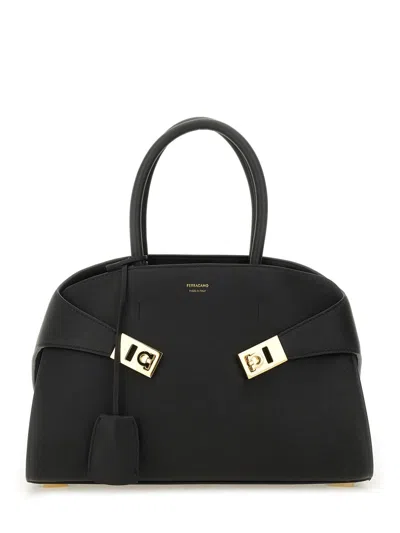 Ferragamo Structured Black Tote Bag With Curved Silhouette And Gold-tone Accents