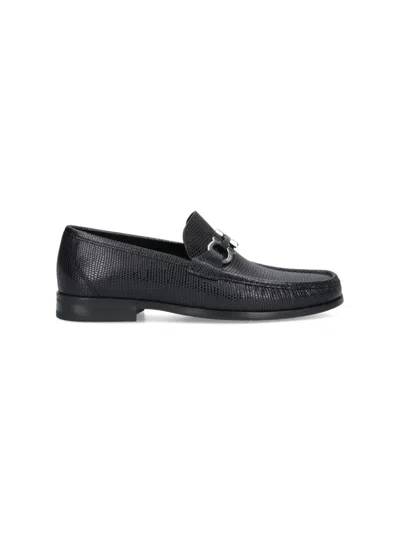 FERRAGAMO TEXTURED BLACK LEATHER LOAFERS WITH METALLIC BIT DETAIL