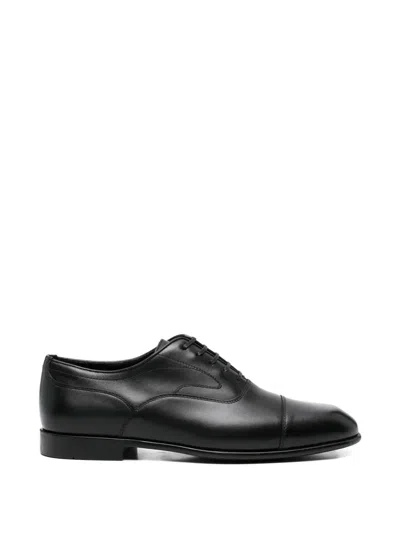 Ferragamo Trinity Oxford Shoes In Black