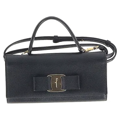 Ferragamo Vara Bow Clutch Bag In Black Leather