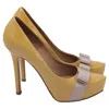 Ferragamo Vara Bow Platform Pumps In Yellow Patent Leather In Animal Print