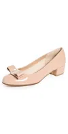 Ferragamo Round Toe Low Block Heel Patent Pumps In Amaretti