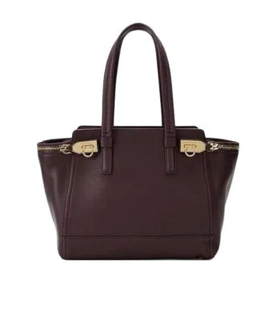Ferragamo Verve Logo Handbag In Black