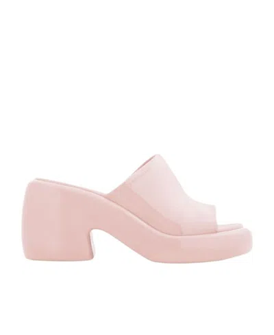 FERRAGAMO WEARING HIGH-HEELED SANDALS