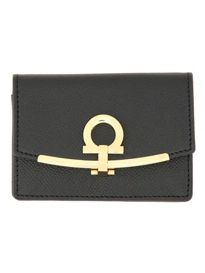 Ferragamo Gancini Pebbled-leather Wallet In Black