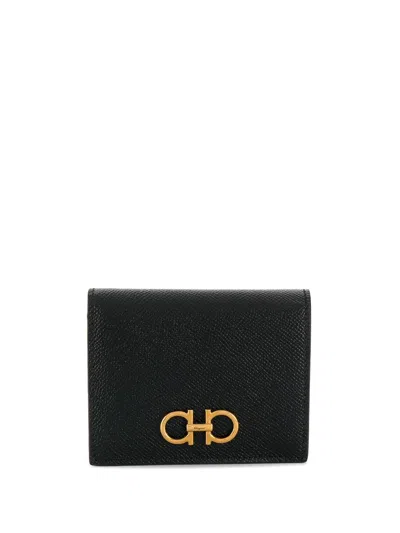 Ferragamo 'gancini' Black Bifold Wallet In Grained Leather Woman