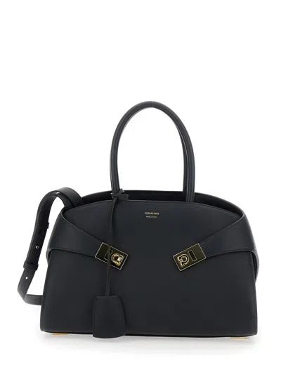 FERRAGAMO FERRAGAMO WOMEN 'HUG S' BLACK HANDBAG WITH LOGO AND GANCINI BUCKLE IN LEATHER WOMAN