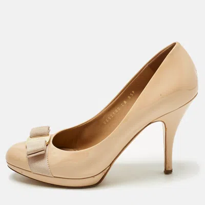 Ferragamo Yellow Patent Leather Vara Bow Platform Pumps In Gold