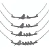 Figs And Ginger Mother Nestling Birds Necklace In Metallic