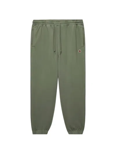 Fingercroxx Drawstring Badge Trousers In Green