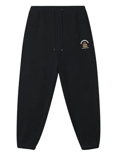 Fingercroxx Embroidered-logo Sweatpants In Black