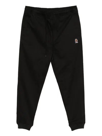 Fingercroxx Embroidered-logo Trousers In Black
