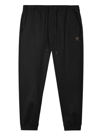 Fingercroxx Logo-patch Cuffed Trousers In Black