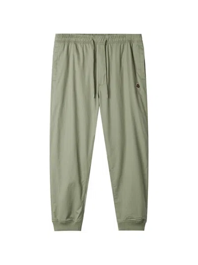Fingercroxx Logo-patch Trousers In Metallic