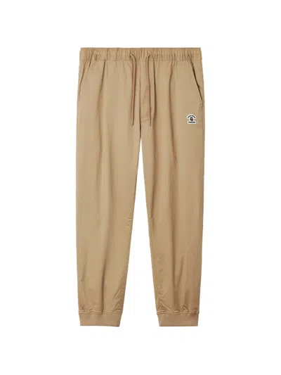 Fingercroxx Logo-patch Tapered Track Pants In Multi