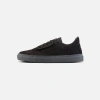 Fini Bold Black Sneaker In Black