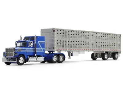 First Gear Ford Ltl 9000 60" Aerodyne Sleeper With Wilson Psal Stockmaster Livestock Trailer Blue With Stripes