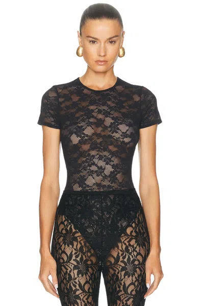 Fleur Du Mal Le Stretch Lace Short Sleeve Bodysuit In Black