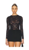 Fleur Du Mal Le Stretch Long Sleeve Thong Bodysuit Black In Black