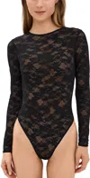 Fleur Du Mal Le Stretch Long Sleeve Thong Bodysuit Black In Black