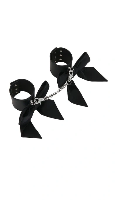 Fleur Du Mal Leather Cuffs With Silk Bows In Black