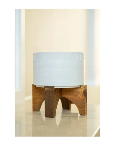 Flora Bunda 7in Dumpling Ceramic Planter On Wood Stand In White