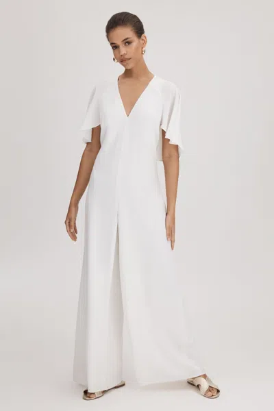 Florere Cape Wide Leg Jumpsuit In Ivory