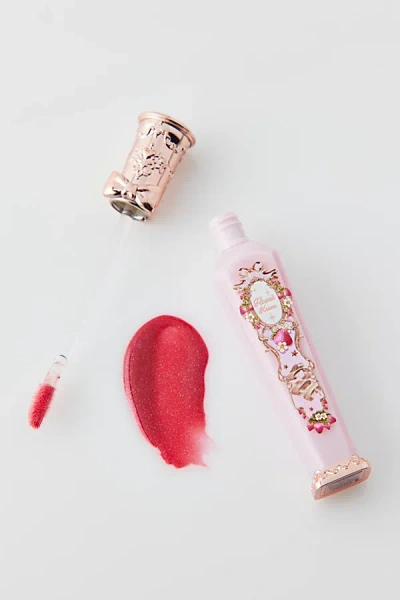 Flower Knows Strawberry Rococo Glowy Lip Gloss At Urban Outfitters In Red