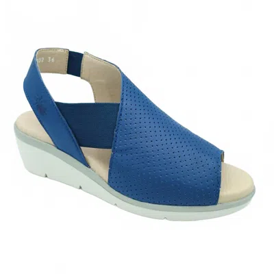 Fly London Nisi Wedge In Blue