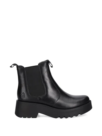 Fly London Platform Chelsea Boots In Black