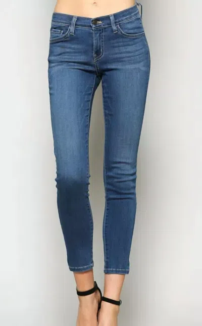Flying Monkey Mid Rise Ankle Skinny Jeans In Blue
