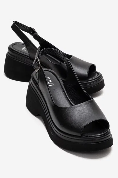 Forever & Always Shoes Laure Leather Wedge Sandal In Black