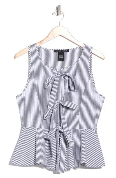Forgotten Grace Bow Front Striped Peplum Tank In Blue