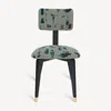 FORNASETTI UPHOLSTERED CHAIR OGGETTI SU CANNETÉ