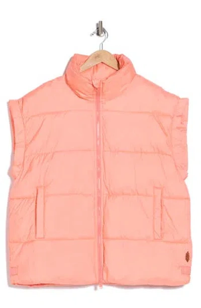 Fp Movement By Free People In A Bubble Oversize Puffer Vest In Orange
