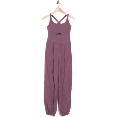 Fp Movement By Free People Righteous Runsie Jumpsuit In Purple Mountain