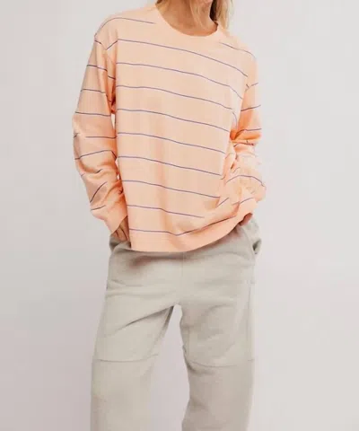 Fp Movement Hustle Striped Layer Top In Awning Stripe Peach In Orange