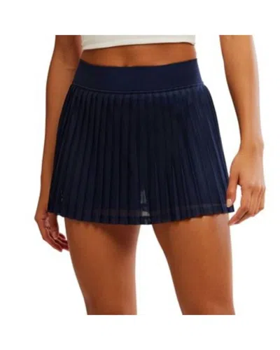 FP MOVEMENT RALLY RUFFLE MINI SKIRT IN MIDNIGHT NAVY