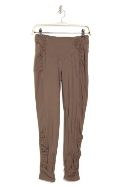 Fp Movement Spin Me Leggings In Light Sand