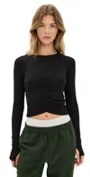Fp Movement Tempo Ruched Long Sleeve Top Black In Black