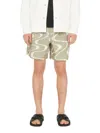 Frame Abstract Wave Graphic Short In Sand Beige Print In Green
