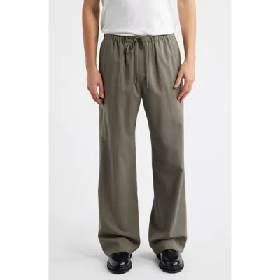 Frame Wool Easy Wide-leg Trousers In Green