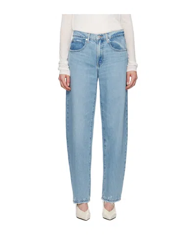 Frame Faded And Trimmed Jeans Pants In Blue